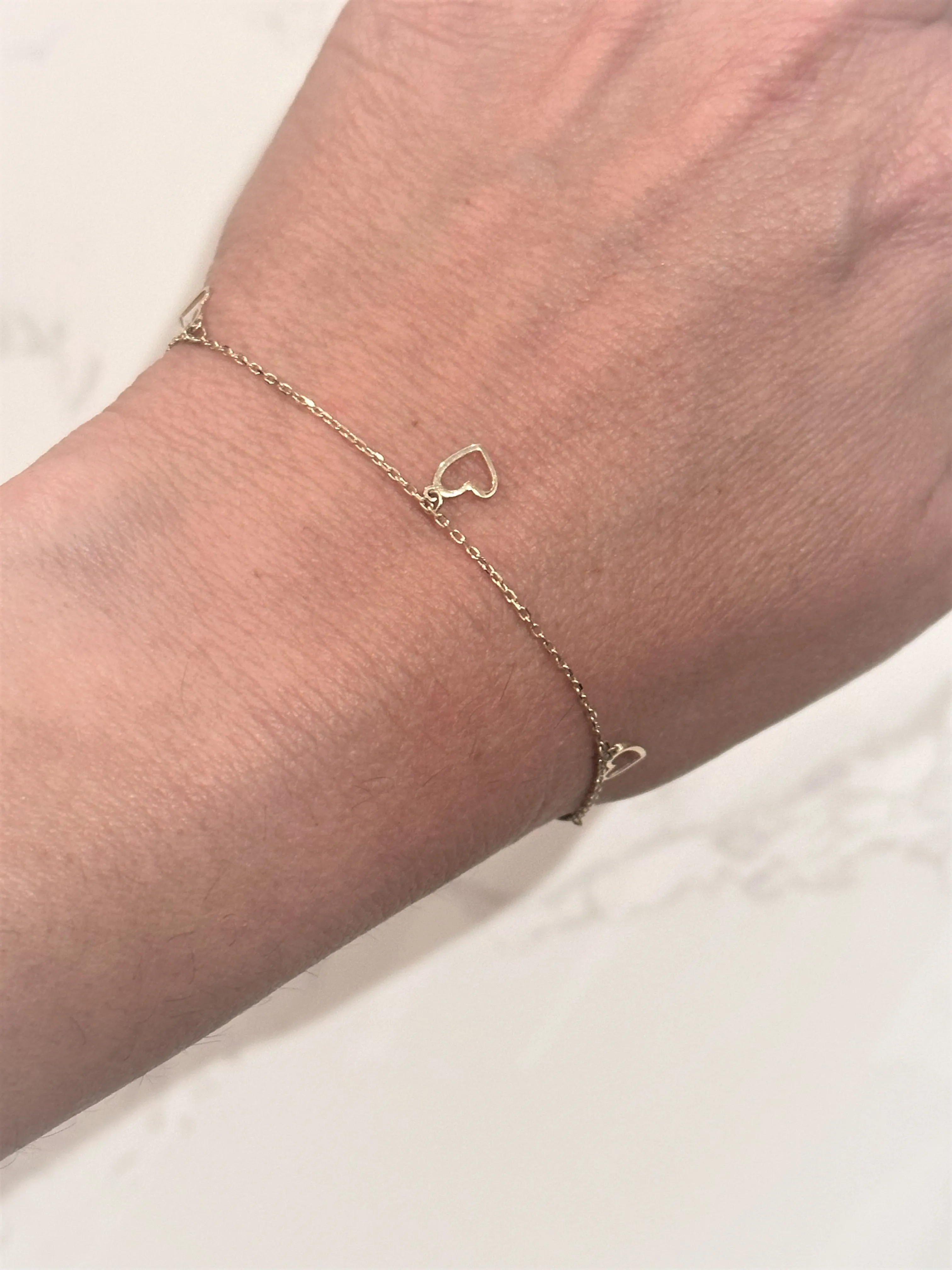 10kt Yellow gold Dangle Heart Charm Bracelet