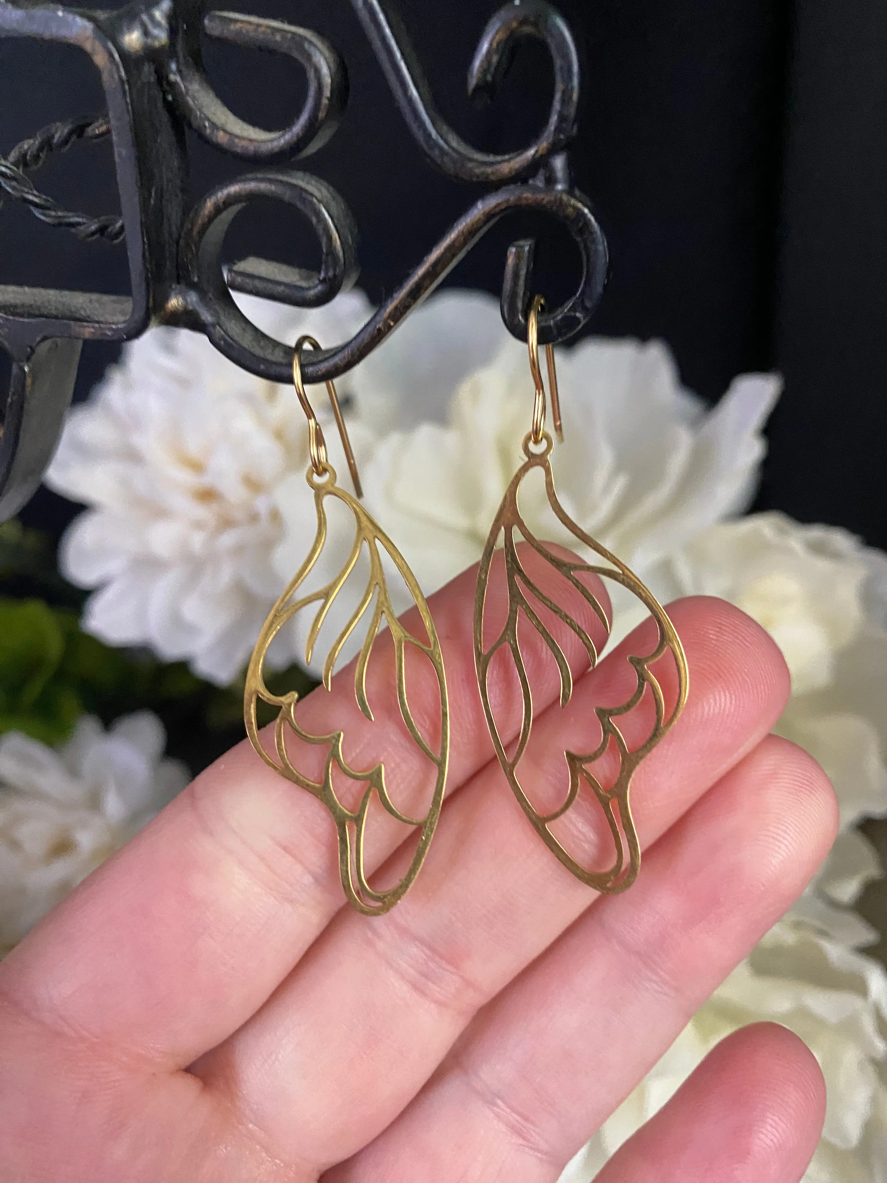 Gold butterfly wing charm earrings