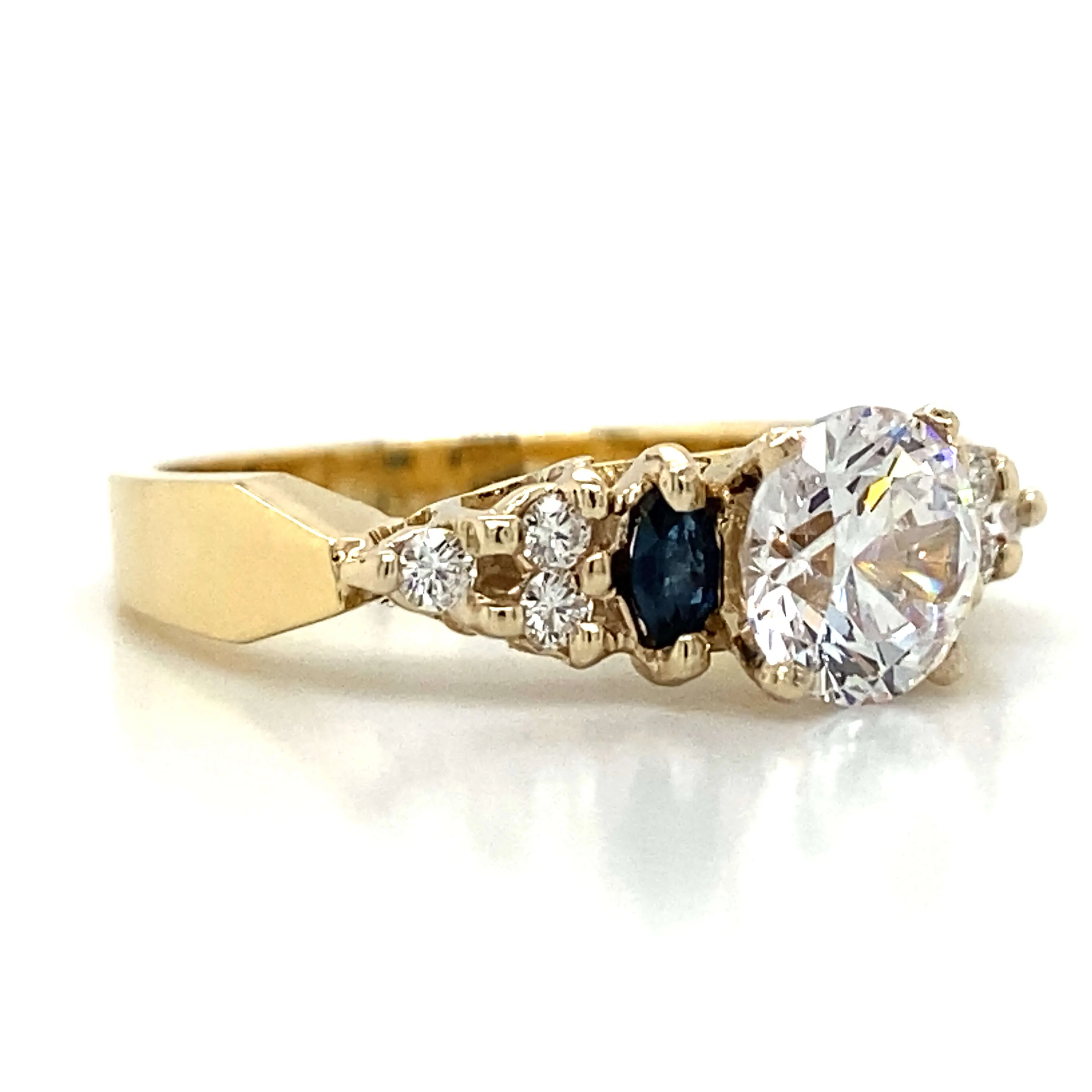 Side Stone Sapphire & Diamond Engagement Ring in 18K Yellow Gold