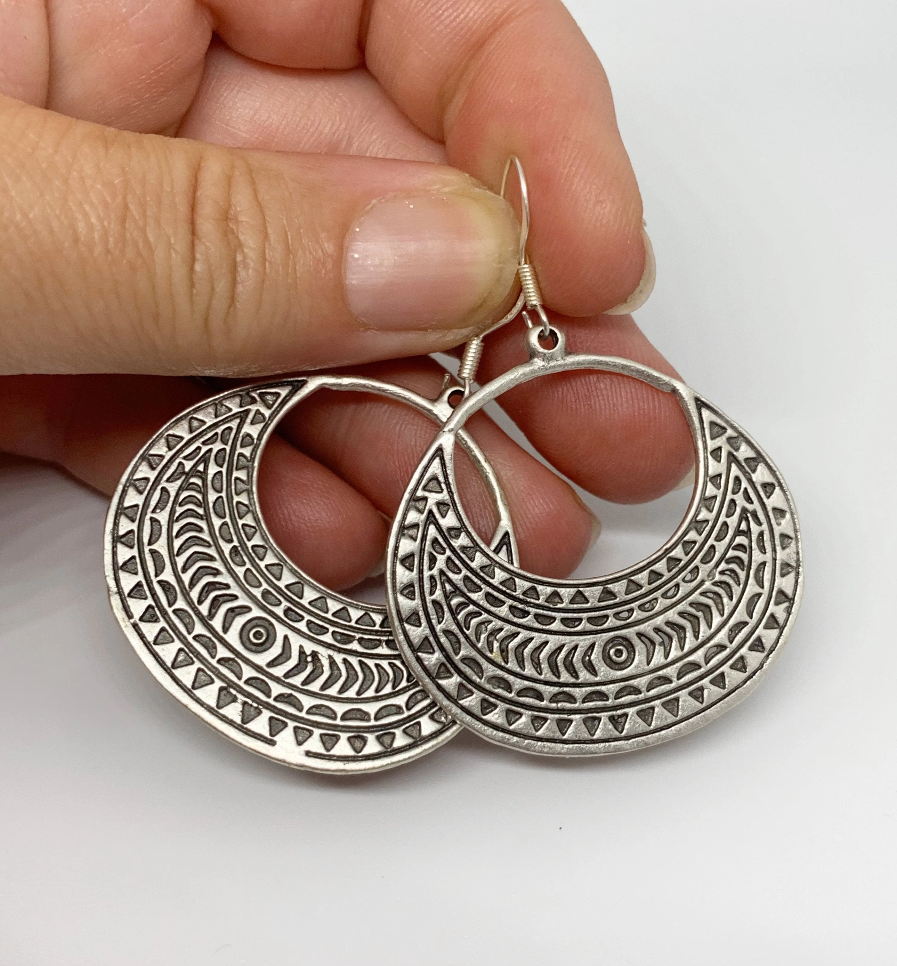 Sterling silver earrings, boho diamond design, jewelry.